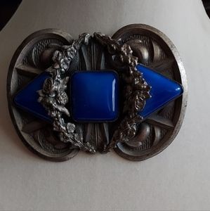 Lovely vintage Brooch. Base metal blue stone. Ornate design